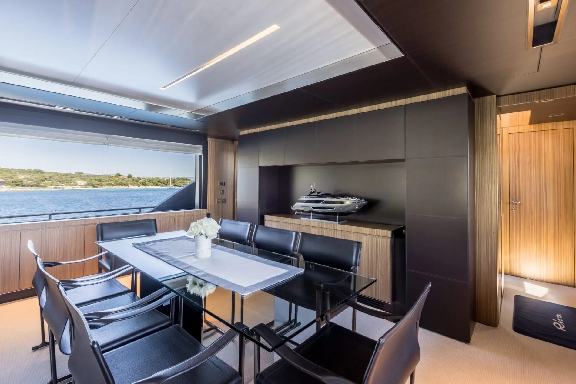 Dining area prepared for guests aboard YOYITA II
