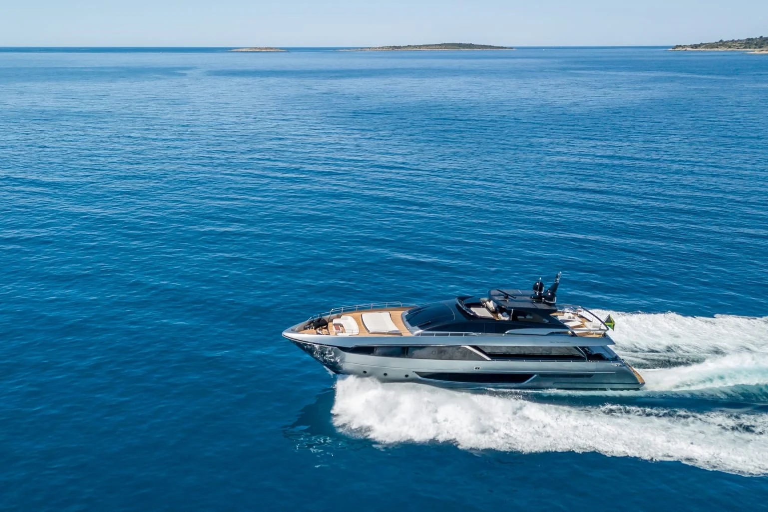 YOYITA II cruising across calm blue water